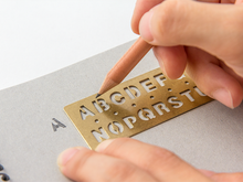Load image into Gallery viewer, Brass Template Bookmark - Alphabet